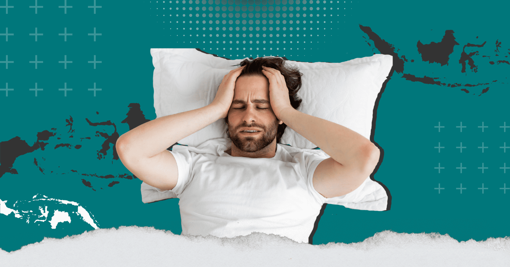 "A distressed man lying in bed holding his head, symbolizing mental stress and the importance of building a strong mind for emotional wellness."